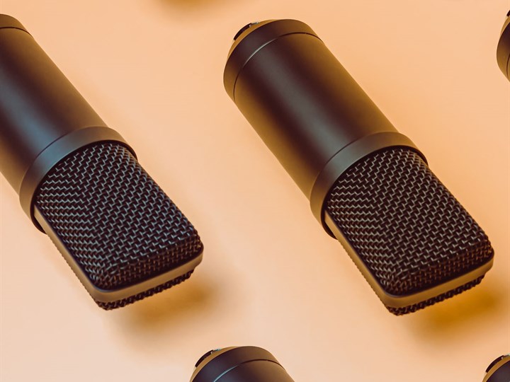 Several condenser microphones arranged on a surface