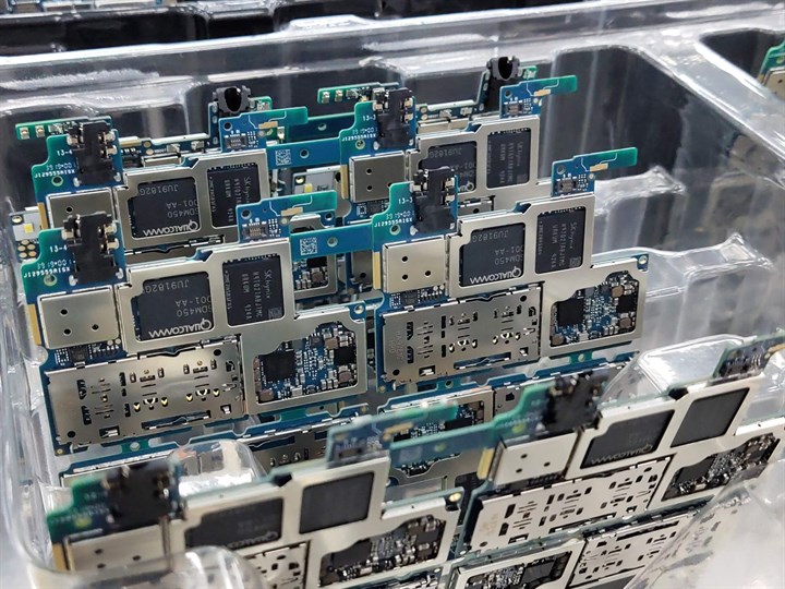 A batch of circuit boards in a tray